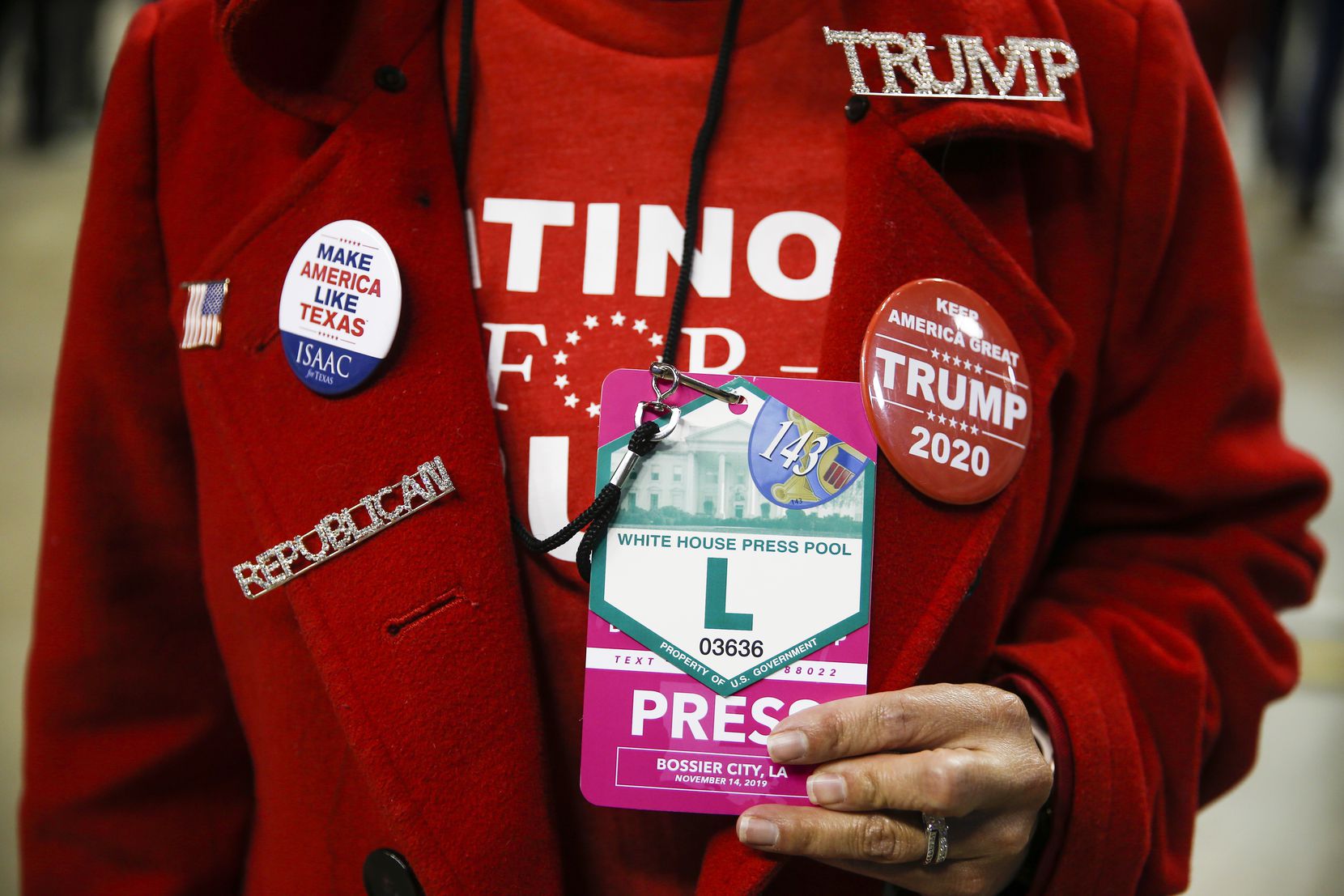 Martha Doss sported an official White House press credential at a rally to reelect President Donald Trump in Bossier City, La., on Nov. 14, 2019. Doss was sent by the National Republican Hispanic Assembly to create social media content.