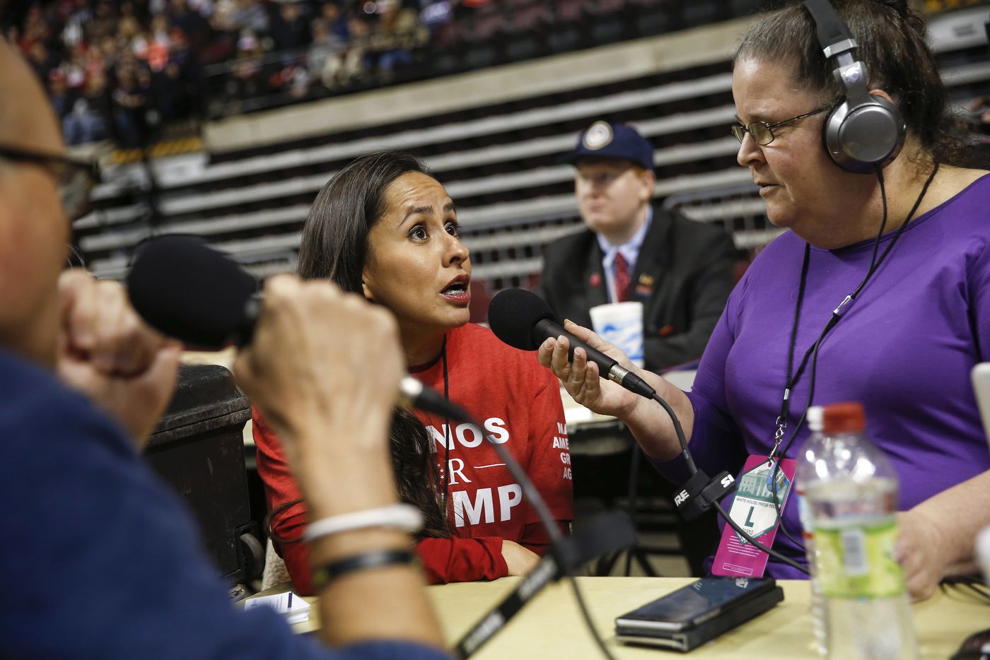 Martha Doss gives an interview to Robert J Wright and Erin McCarty of KEEL 710 AM radio during a rally to reelect President Donald Trump in Bossier City, La.