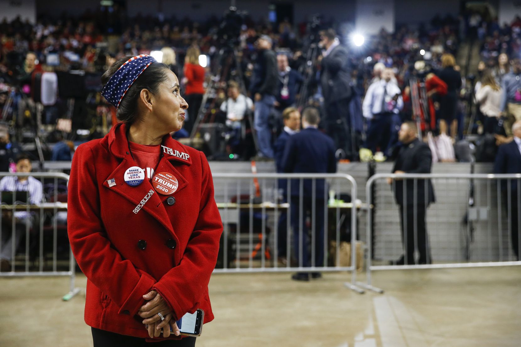 With members of the press in the background, Martha Doss awaited the arrival of President Donald Trump at a November reelection event in Bossier City.