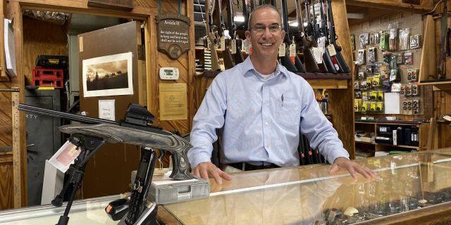 Carey Baker, co-owner of A.W. Peterson Gun Shop in Mount Dora, Florida.