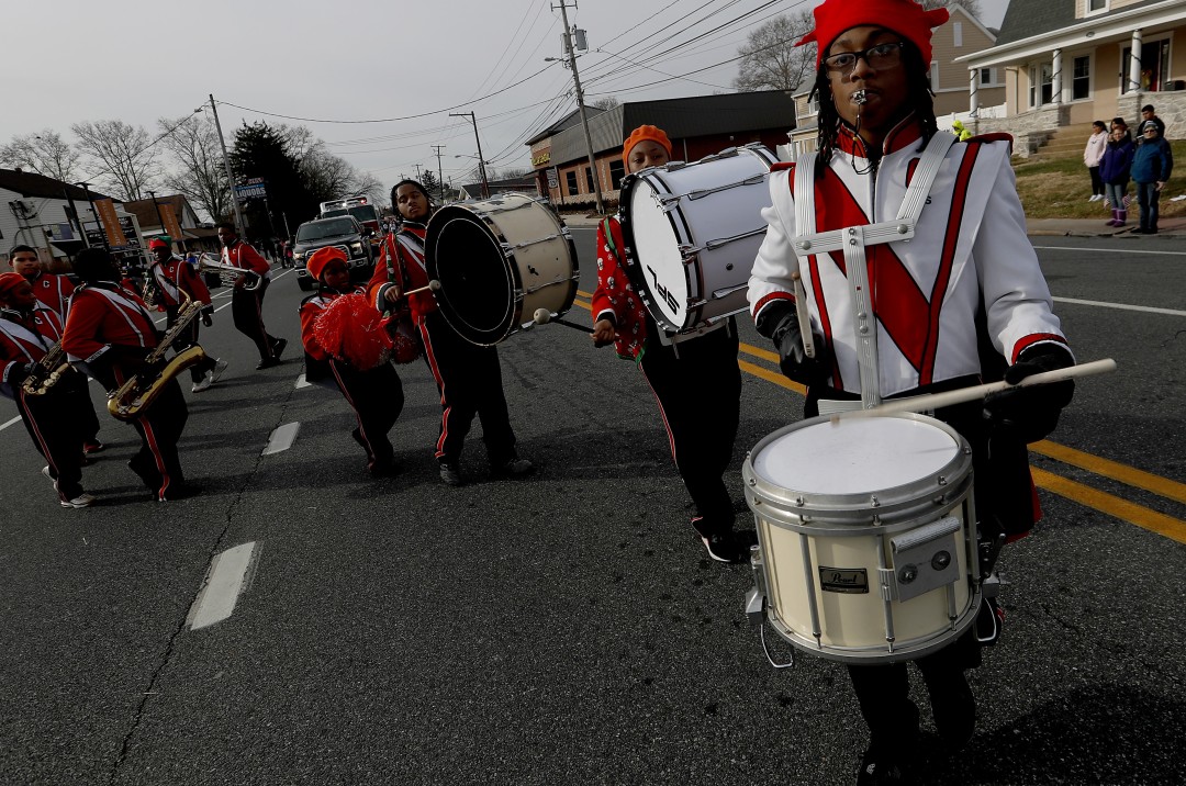 A high school marching band participates in a parade in the Wilmington suburb of Claymont.