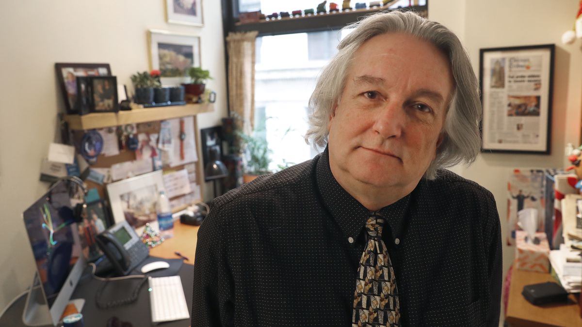 In this Monday, March 9, 2020, photo, David Kidwell, special projects editor with the Better Government Association, poses for a portrait at his office office in Chicago. Political misinformation is often considered a national and international challenge, in part because of the Russian-based trolls and bots who spread false claims and sowed division in a bid to influence the 2016 U.S. election. It's increasingly a problem on Main Street, too, as local candidates and politicians adopt misinformation tactics and local news organizations shrink or shut down, leaving residents with fewer credible sources of information. (AP Photo/Charles Rex Arbogast)