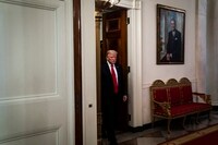 Image: President Trump arrives April 29 for a roundtable with industry executives on the plan for Opening Up America Again in the State Dining Room at the White House.