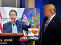 Image: At the April 19 daily briefing by the coronavirus task force, Trump shows video of New York Gov. Andrew M. Cuomo (D) thanking his administration for its assistance to New York in managing the health crisis.