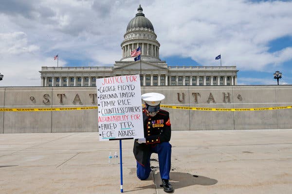 Todd Winn, a retired Marine, protested in front of the Utah State Capitol in Salt Lake City on June 5.
