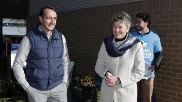 Liberal MP Dave Sharma and Liberal candidate Fiona Kotvojs at the Jerrabomberra Public School on Saturday. 