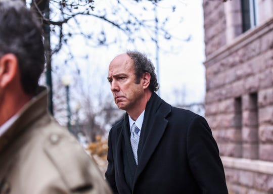 Paul Erickson leaves the federal courthouse on Tuesday, Nov. 26, 2019, at the Federal District Court Clerk in Sioux Falls, S.D. Erickson pleaded guilty to one charge of wire fraud and one charge of money laundering.
