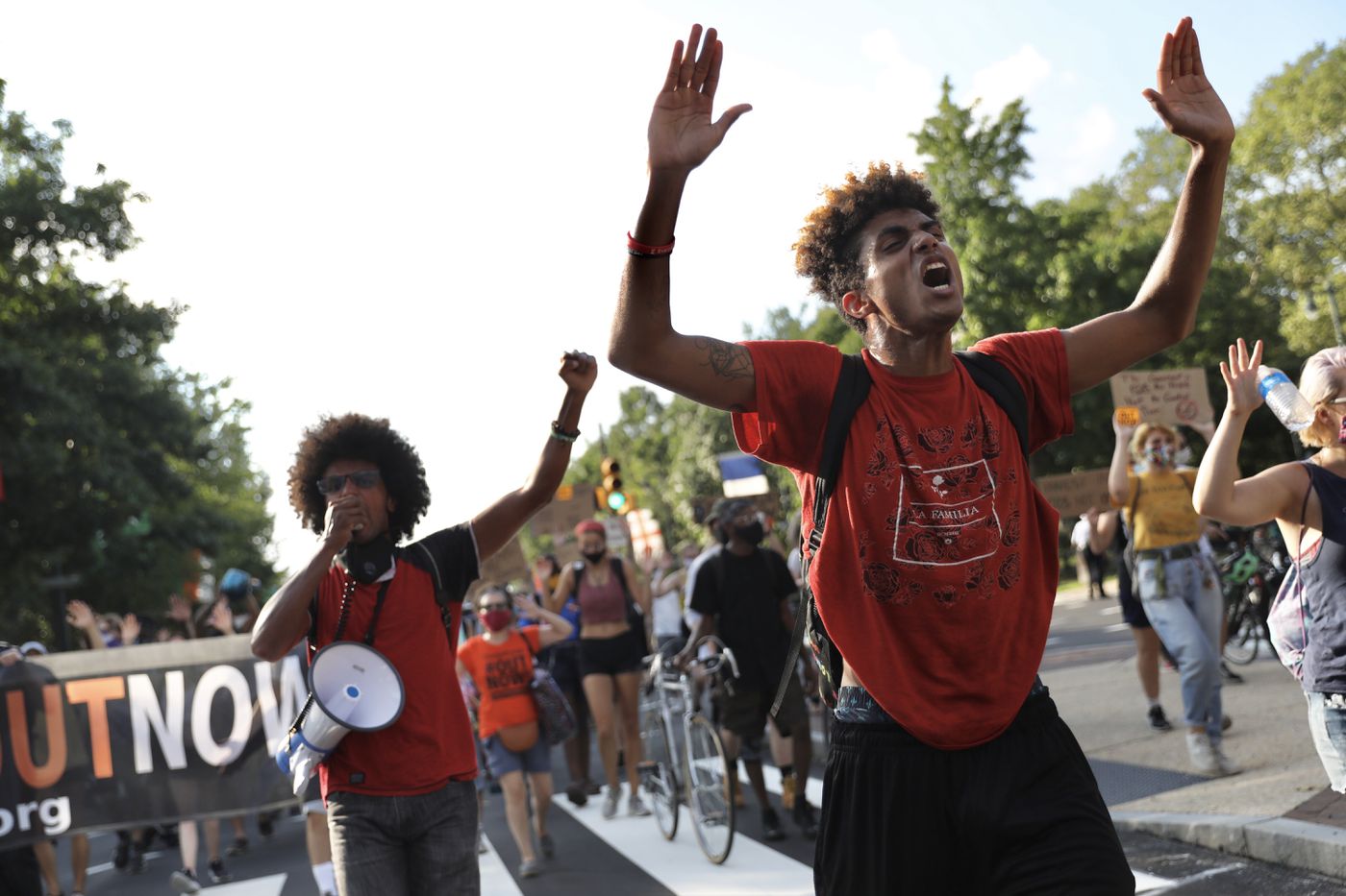 Kendell Simmons, left, of the group Delco Resists, and Xavier Wofford of the group I Will Breathe, lead a chant during a protest Saturday in Philadelphia in support of Black Lives Matter and against the Trump administration’s deployment of federal officers to U.S. cities.