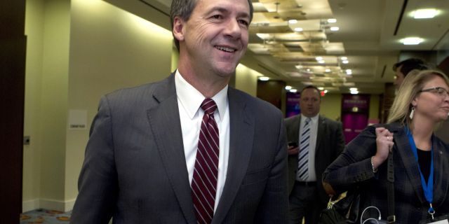Montana Gov. Steve Bullock walks to a meeting during the National Governors Association 2019 winter meeting in Washington. (AP Photo/Jose Luis Magana, File)