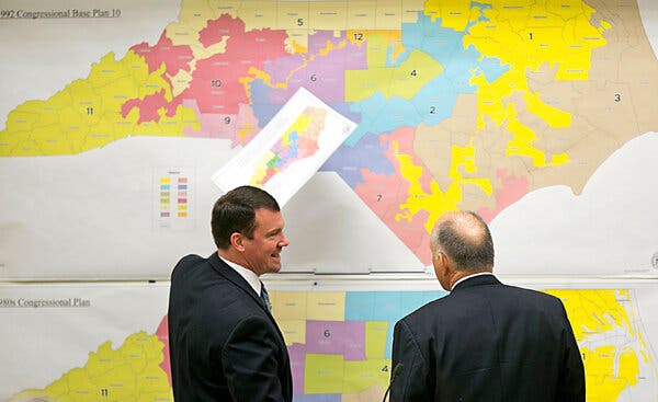 Republican state Senators Dan Soucek, left, and Brent Jackson, right, review historical maps at the General Assembly in Raleigh, N.C. in 2016.