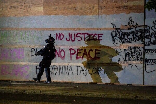 A police officer in Portland, Ore., last month. Over the decades, the Republican Party has participated less in the conversation on solutions to urban problems. 