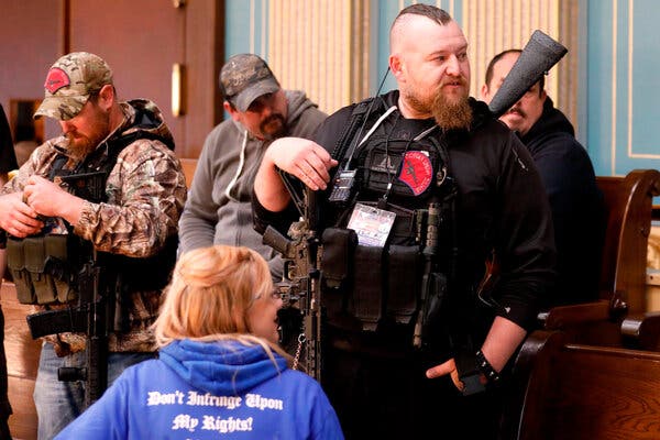 William Null, who was charged with plotting to kidnap Gov. Gretchen Whitmer of Michigan, was part of an armed rally at the Michigan State Capitol in Lansing in April.