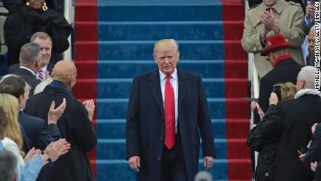 Donald Trump arrives on the platform at the US Capitol for his swearing-in ceremony on January 20, 2017.