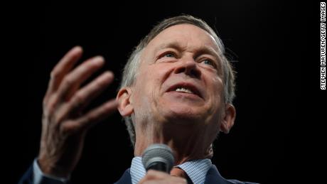 In this December 3, 2019, file photo, then-Democratic presidential candidate John Hickenlooper speaks during a forum on gun safety at the Iowa Events Center in Des Moines. 