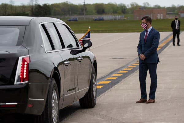 Speaker Lee Chatfield of the Michigan House of Representatives waits for President Trump to exit Air Force One in Detroit in May. 