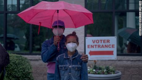 Biden supporter Bridgette Hodges and her 8-year-old grandchild Sanaa waited in an early voting line for over two hours.